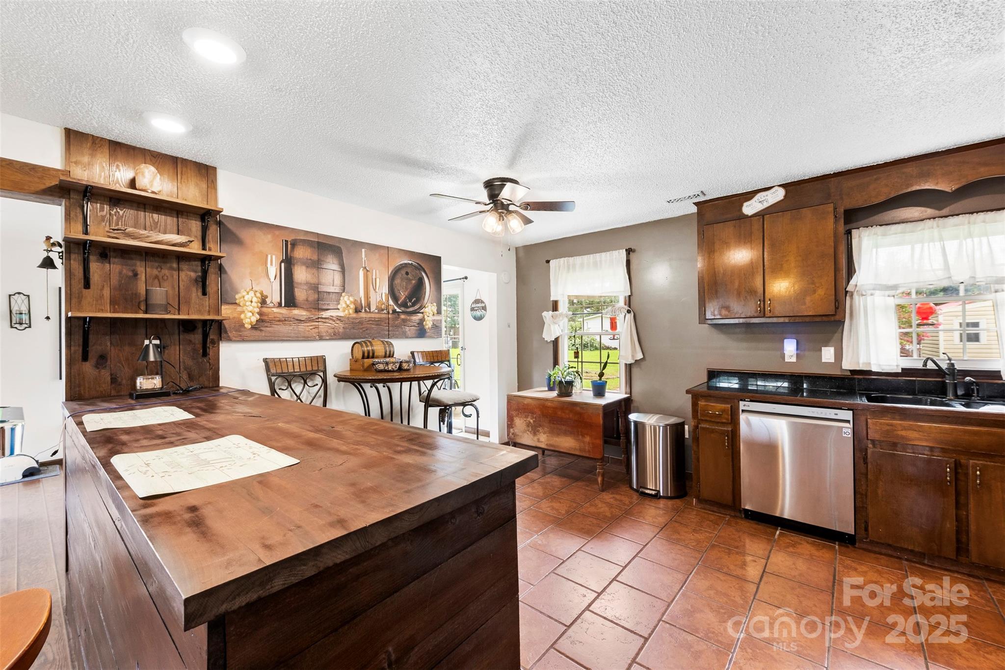 111 Hicks Road, Unit 9 Grover, NC 28073 - Photo 12 of 29 a kitchen with stainless steel appliances granite countertop a sink dishwasher stove refrigerator and cabinets