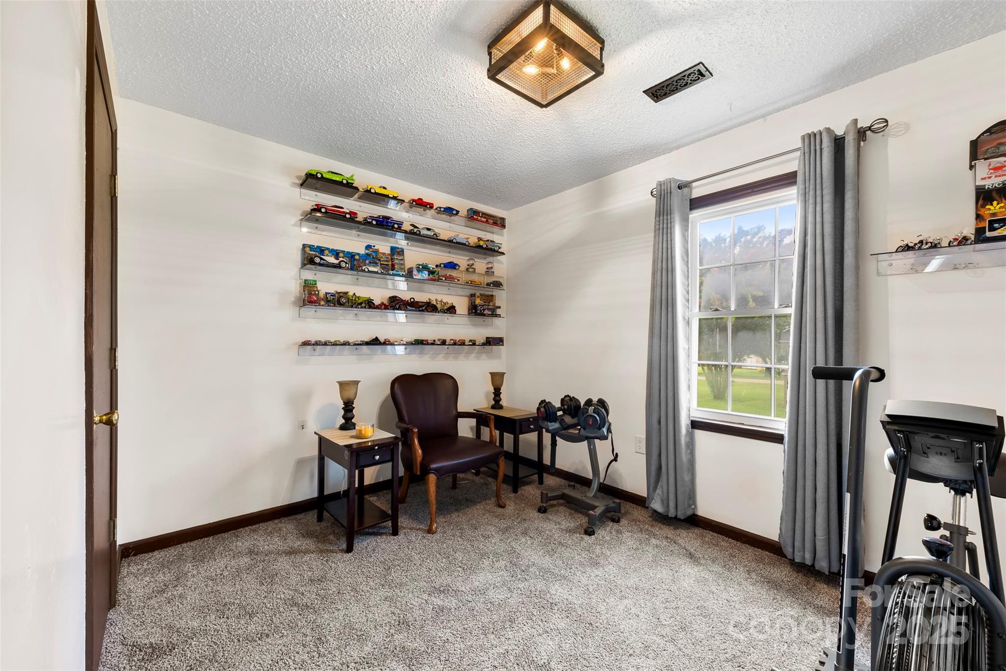 111 Hicks Road, Unit 9 Grover, NC 28073 - Photo 17 of 29 a view of a workspace with furniture and a window