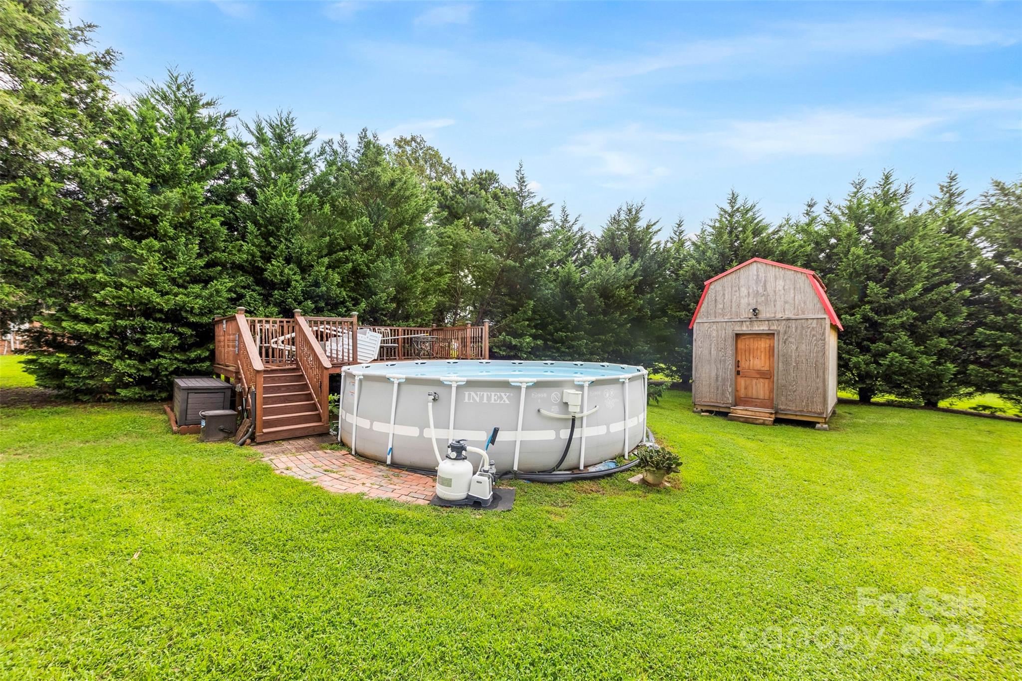 111 Hicks Road, Unit 9 Grover, NC 28073 - Photo 22 of 29 a view of a back yard with a house and garden