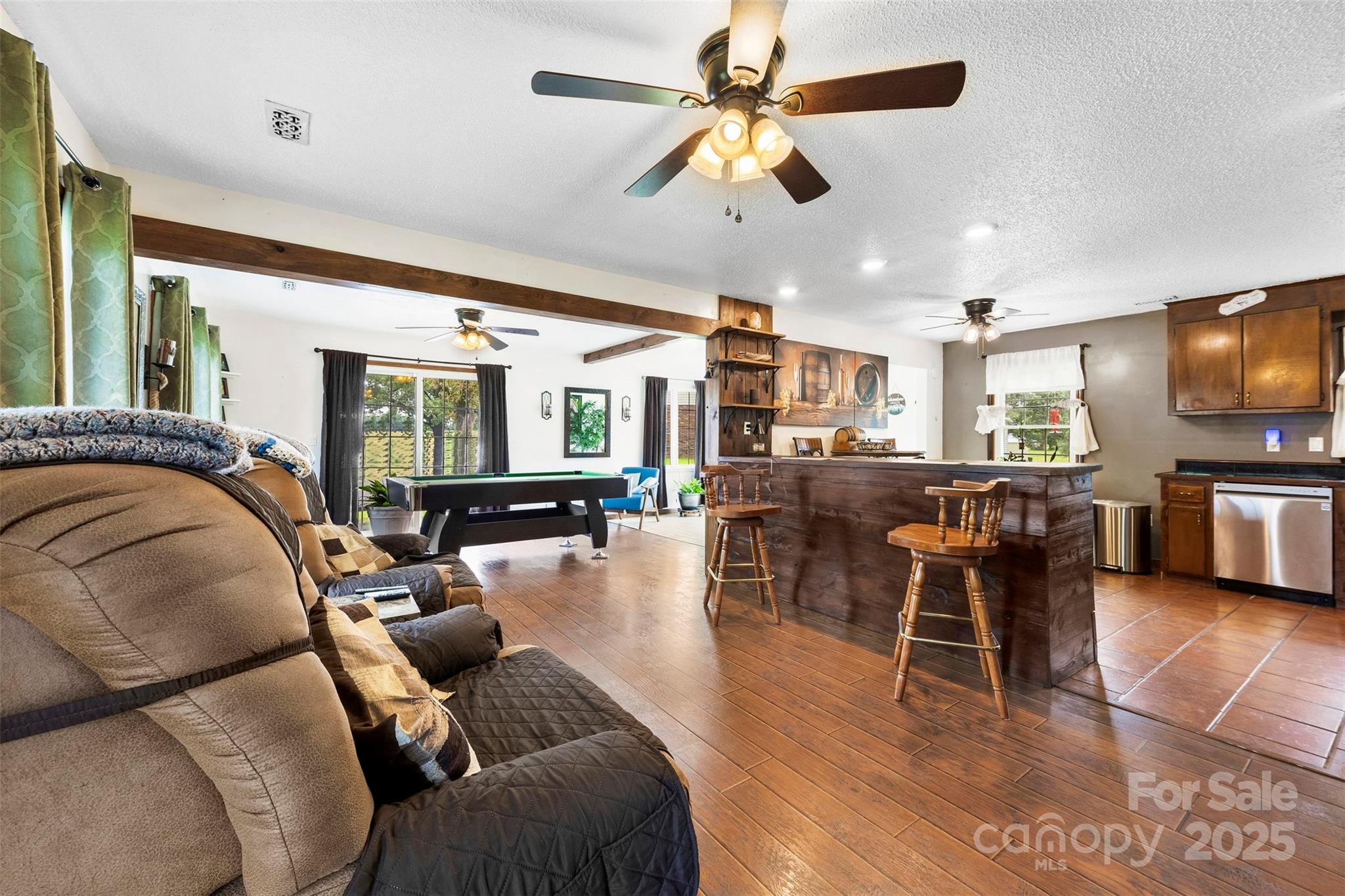 111 Hicks Road, Unit 9 Grover, NC 28073 - Photo 3 of 29 a living room with furniture and a flat screen tv