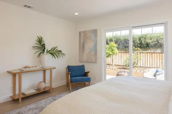 a bathroom with a shower and a window
