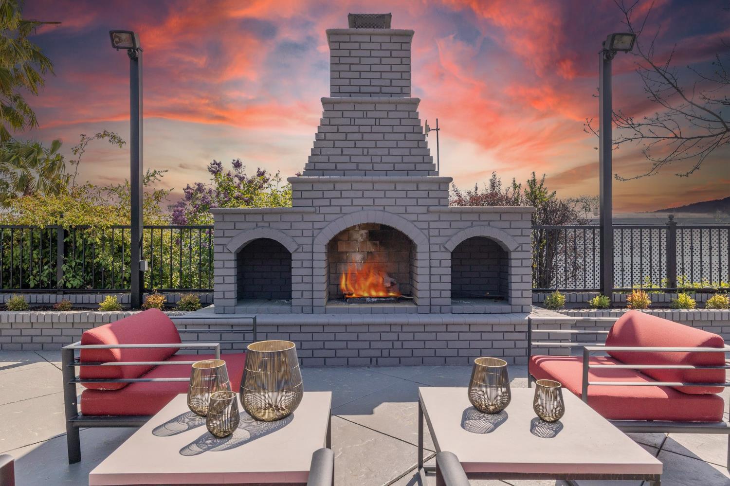 4800 Auburn Folsom Road, Unit 29 Loomis, CA 95650 - Photo 11 of 19 a view of a patio with couches chairs and a fire pit