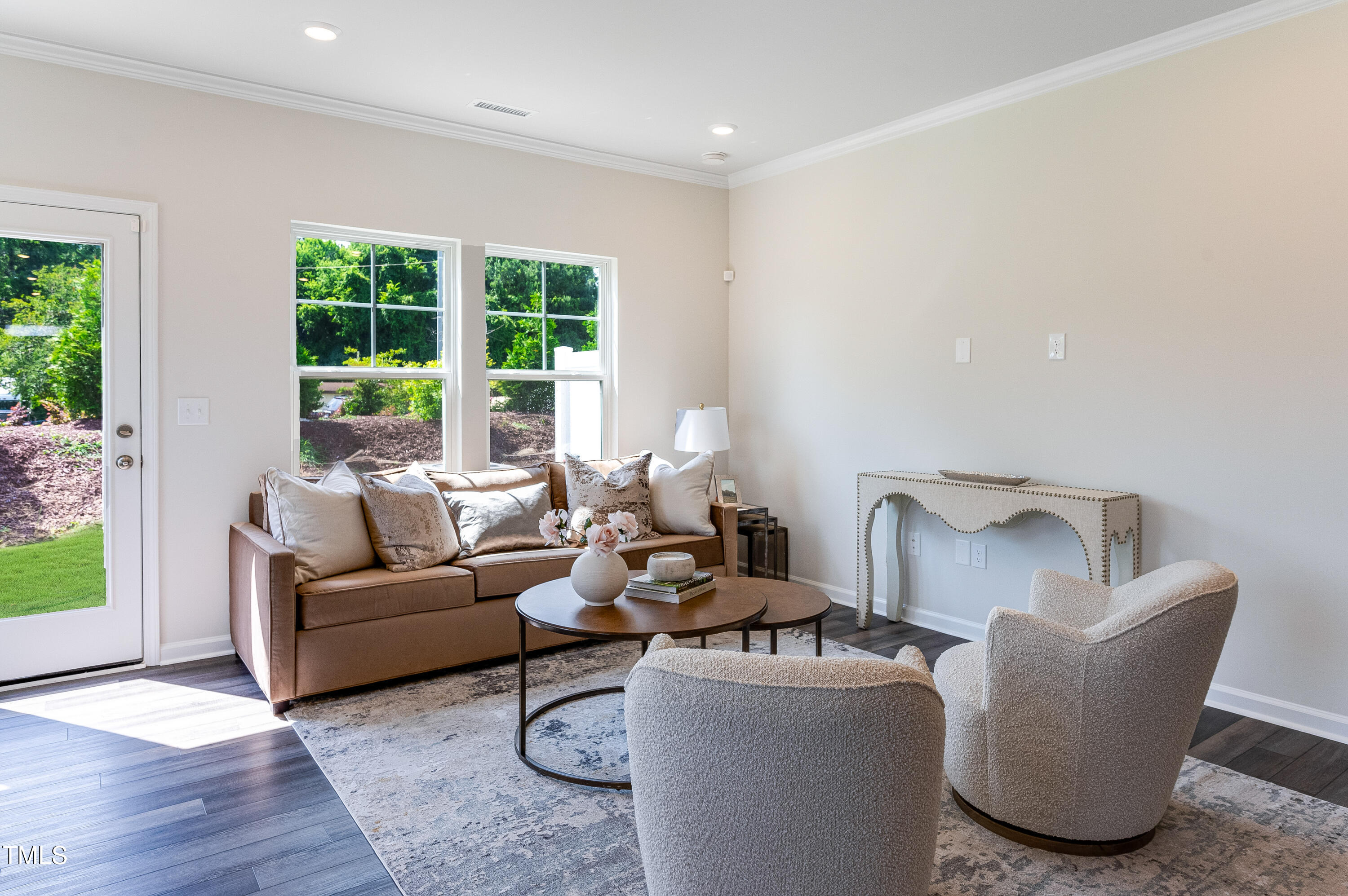 2217 Titanium Rock Road Durham, NC 27704 - Photo 12 of 27 a living room with furniture and a large window