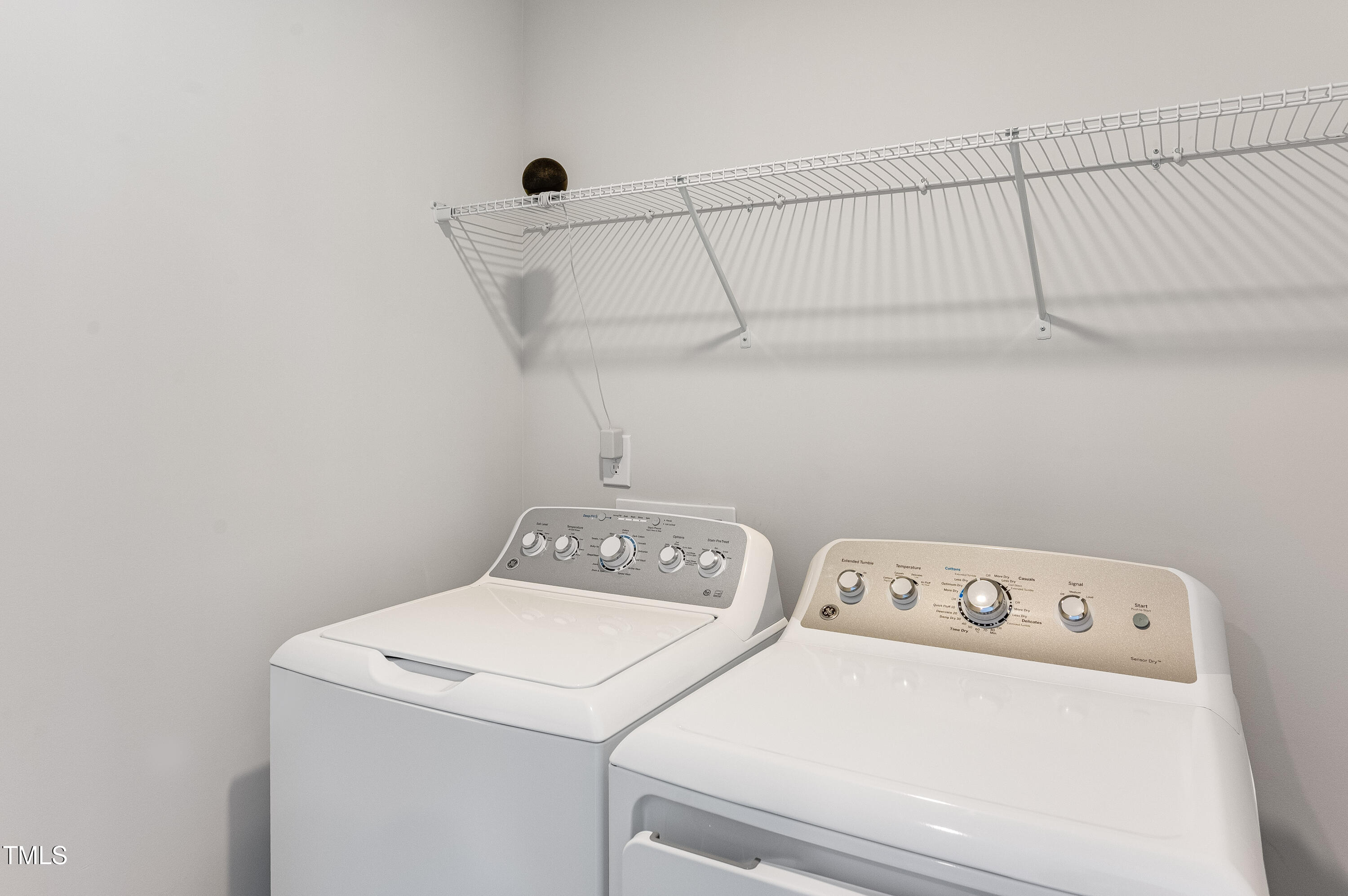 2217 Titanium Rock Road Durham, NC 27704 - Photo 19 of 27 a utility room with dryer and washer