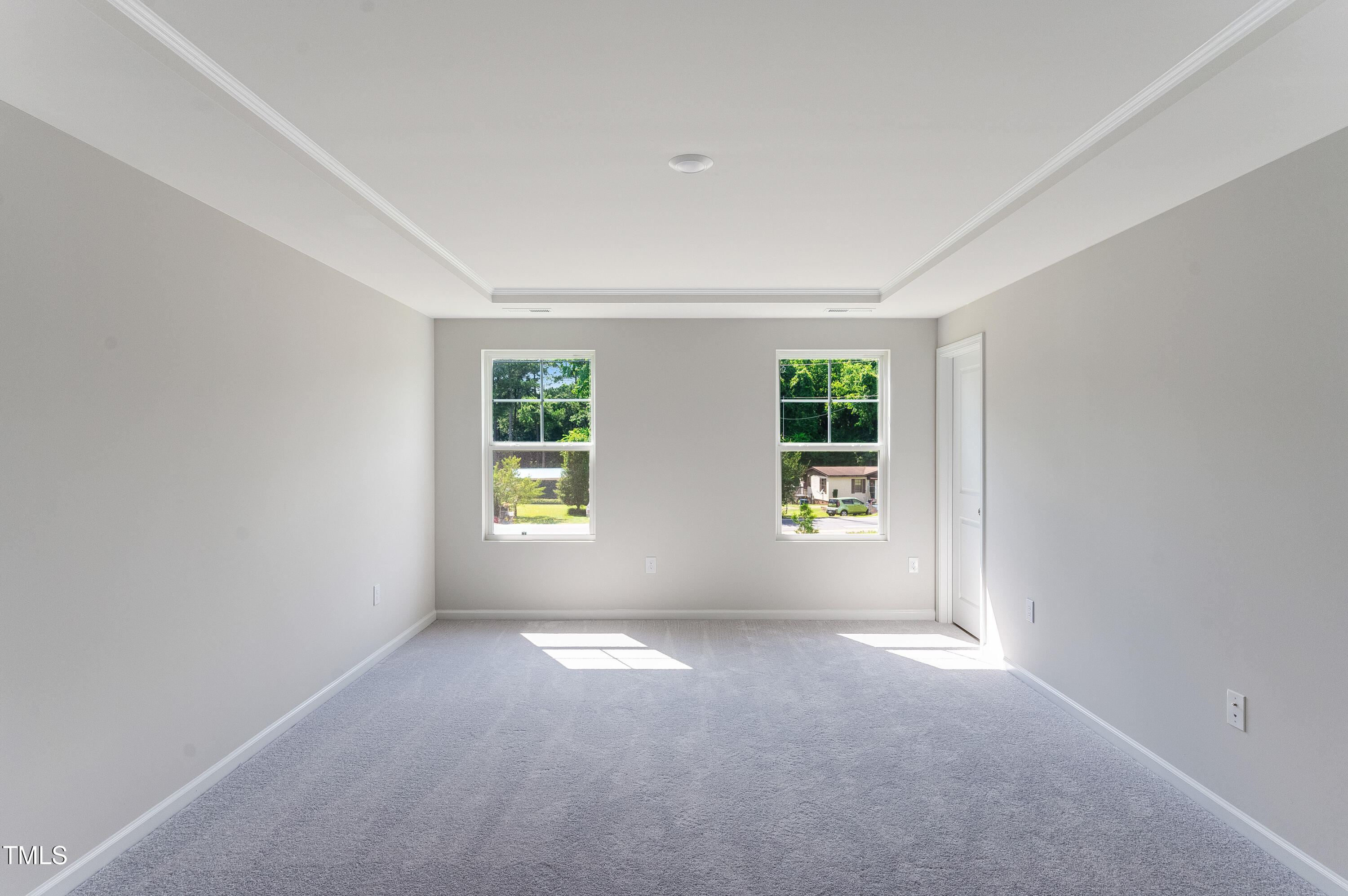 2217 Titanium Rock Road Durham, NC 27704 - Photo 20 of 27 an empty room with windows