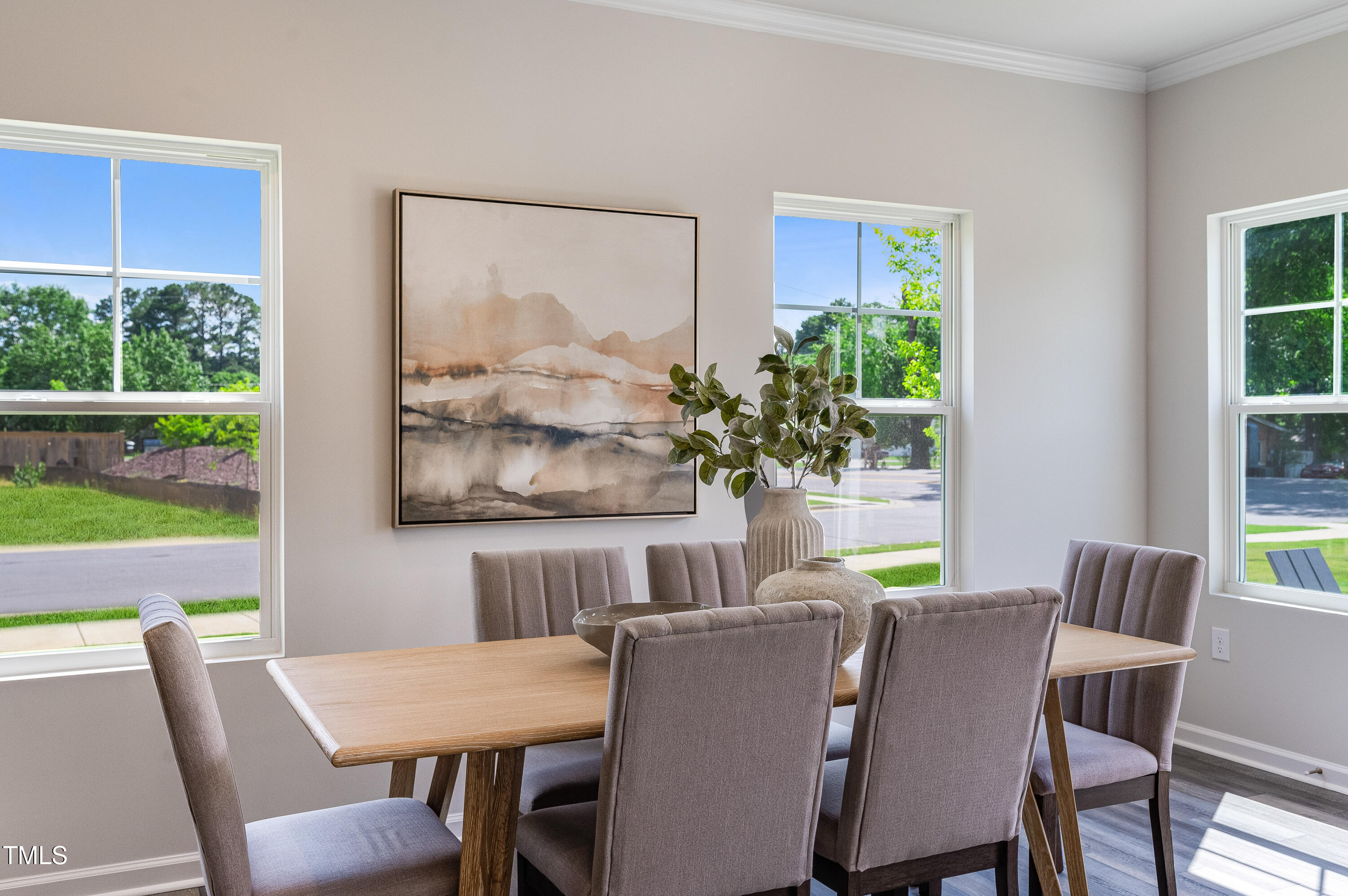 2217 Titanium Rock Road Durham, NC 27704 - Photo 9 of 27 a view of a dining room with furniture window and outside view
