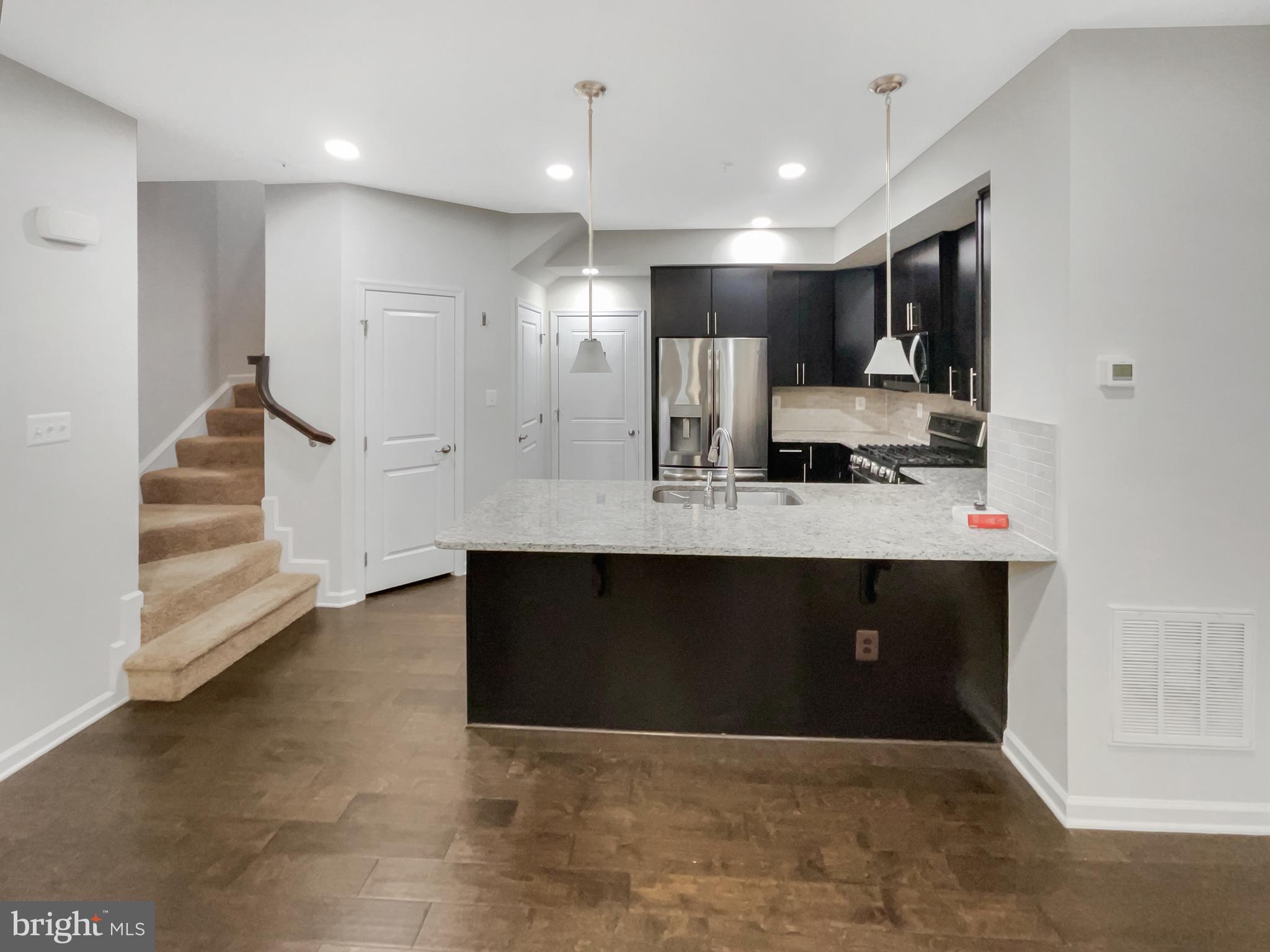 13731 Endeavour Drive Herndon, VA 20171 - Photo 11 of 37 a bathroom with a sink double vanity and a mirror