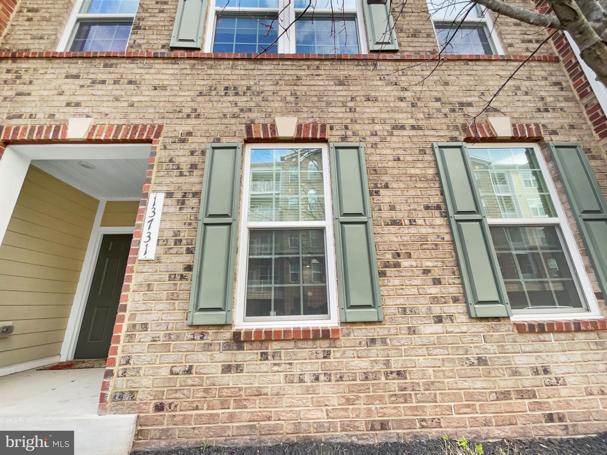 13731 Endeavour Drive Herndon, VA 20171 - Photo 14 of 37 a brick building with a window and door