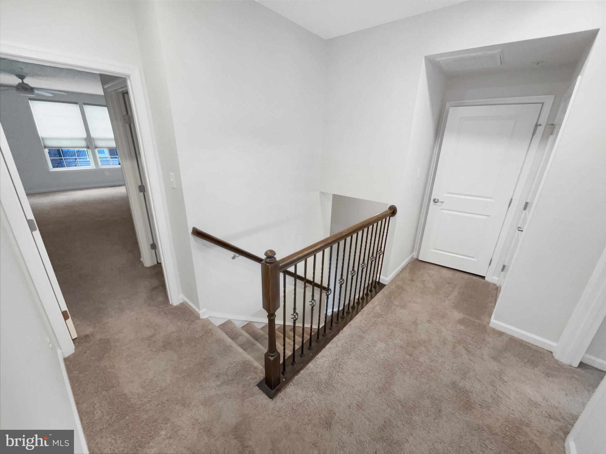 13731 Endeavour Drive Herndon, VA 20171 - Photo 18 of 37 a view of a hallway with staircase