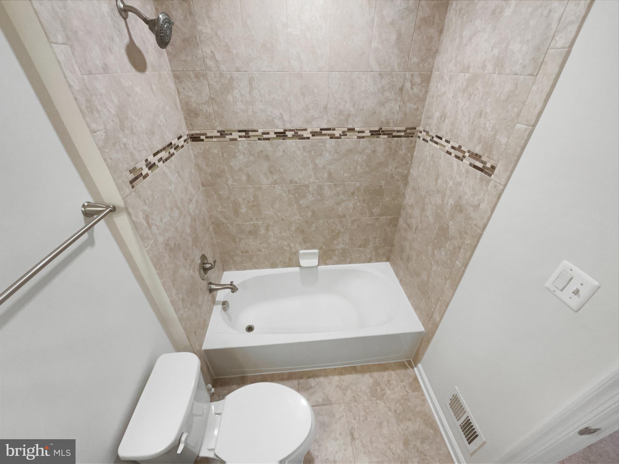 13731 Endeavour Drive Herndon, VA 20171 - Photo 27 of 37 a bathroom with a sink toilet and shower