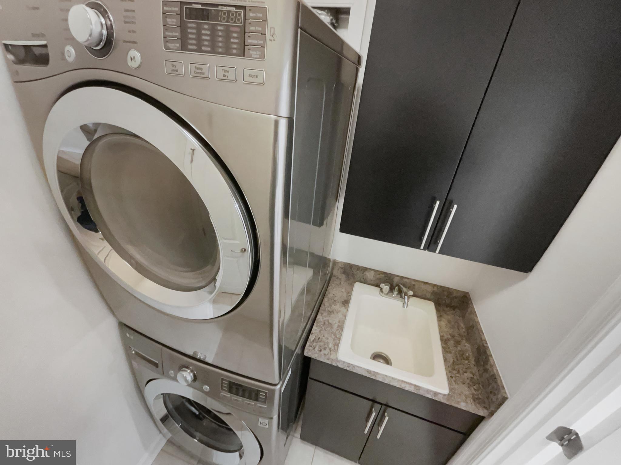 13731 Endeavour Drive Herndon, VA 20171 - Photo 35 of 37 a utility room with dryer and washer