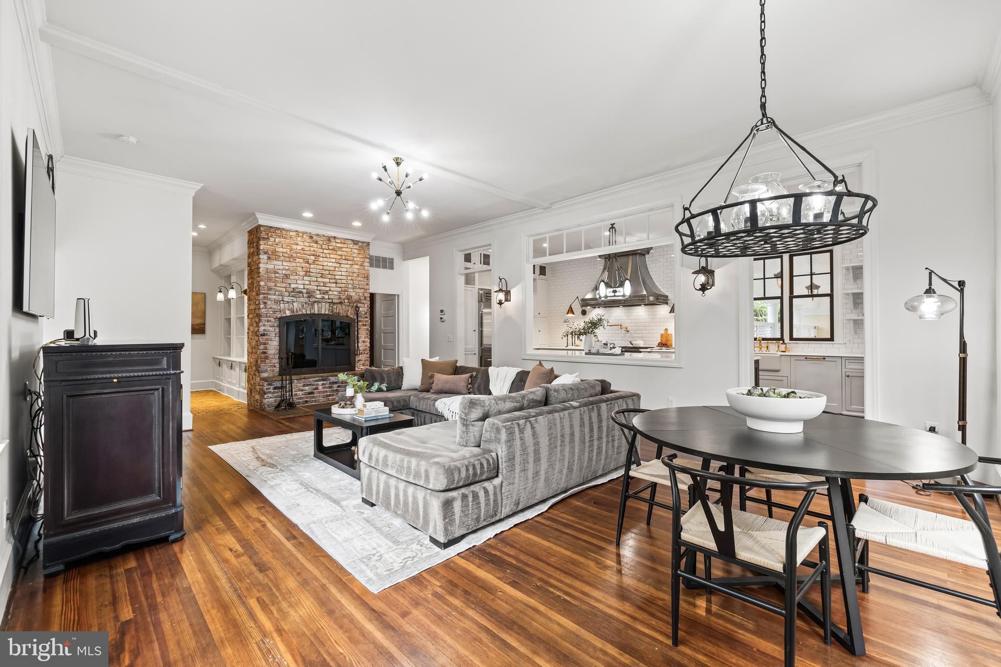 1926 Ruxton Road Ruxton, MD 21204 - Photo 23 of 106 a living room with fireplace furniture and a flat screen tv