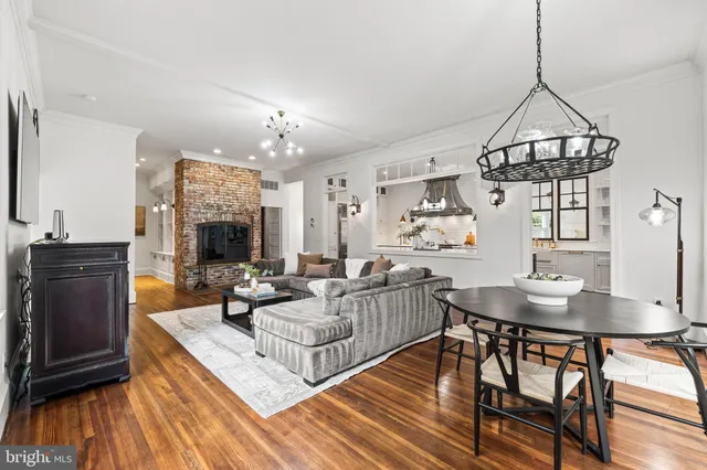 a view of staircase with railing and white walls
