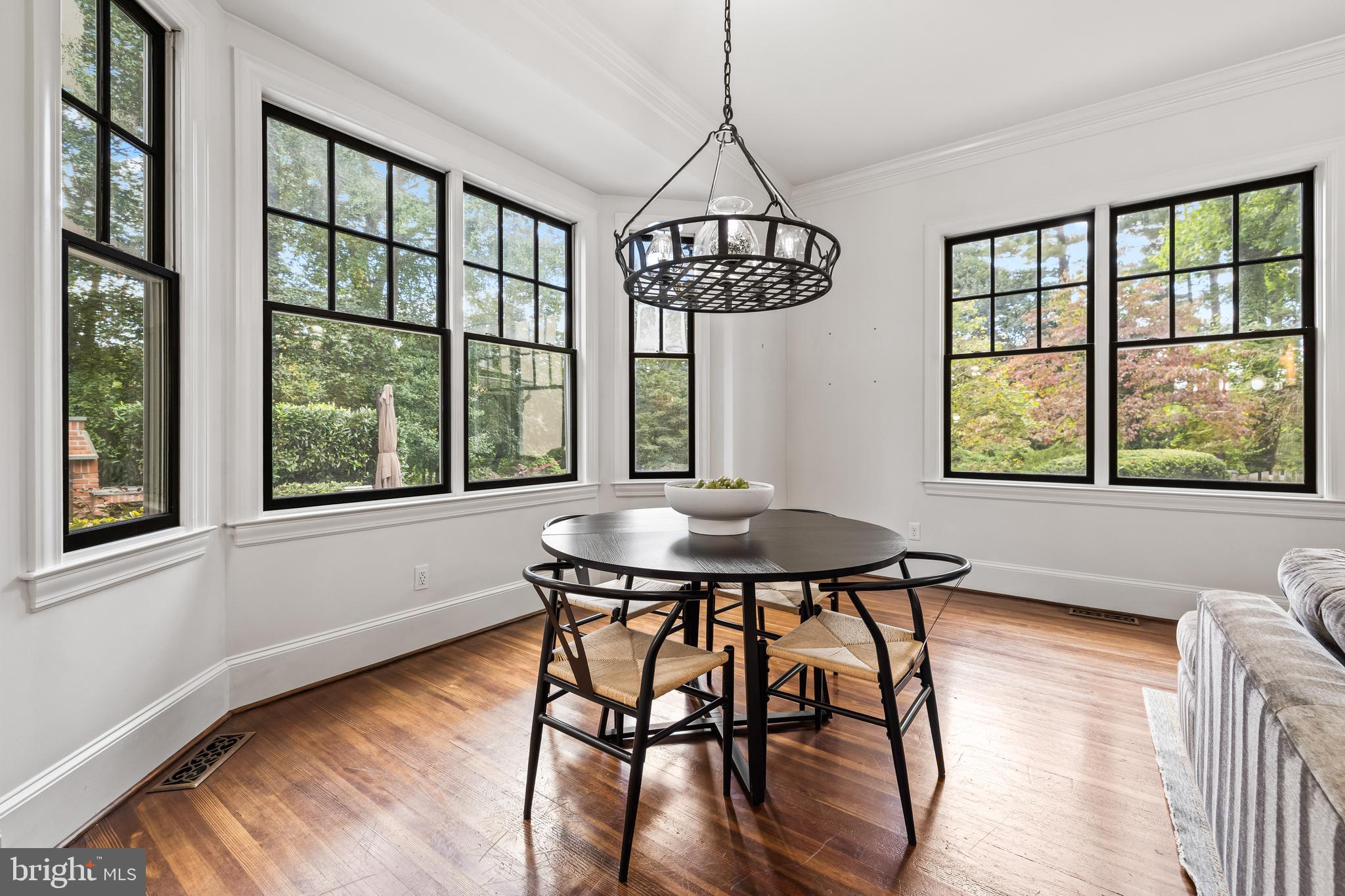 1926 Ruxton Road Ruxton, MD 21204 - Photo 27 of 108 a view of a dining room with furniture window and wooden floor