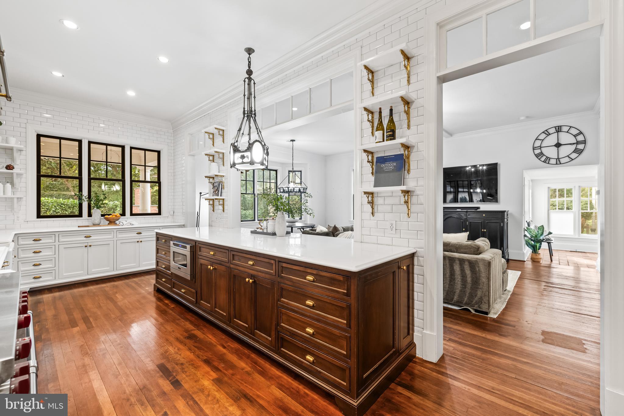 1926 Ruxton Road Ruxton, MD 21204 - Photo 30 of 106 a kitchen with stainless steel appliances granite countertop a sink cabinets and wooden floor