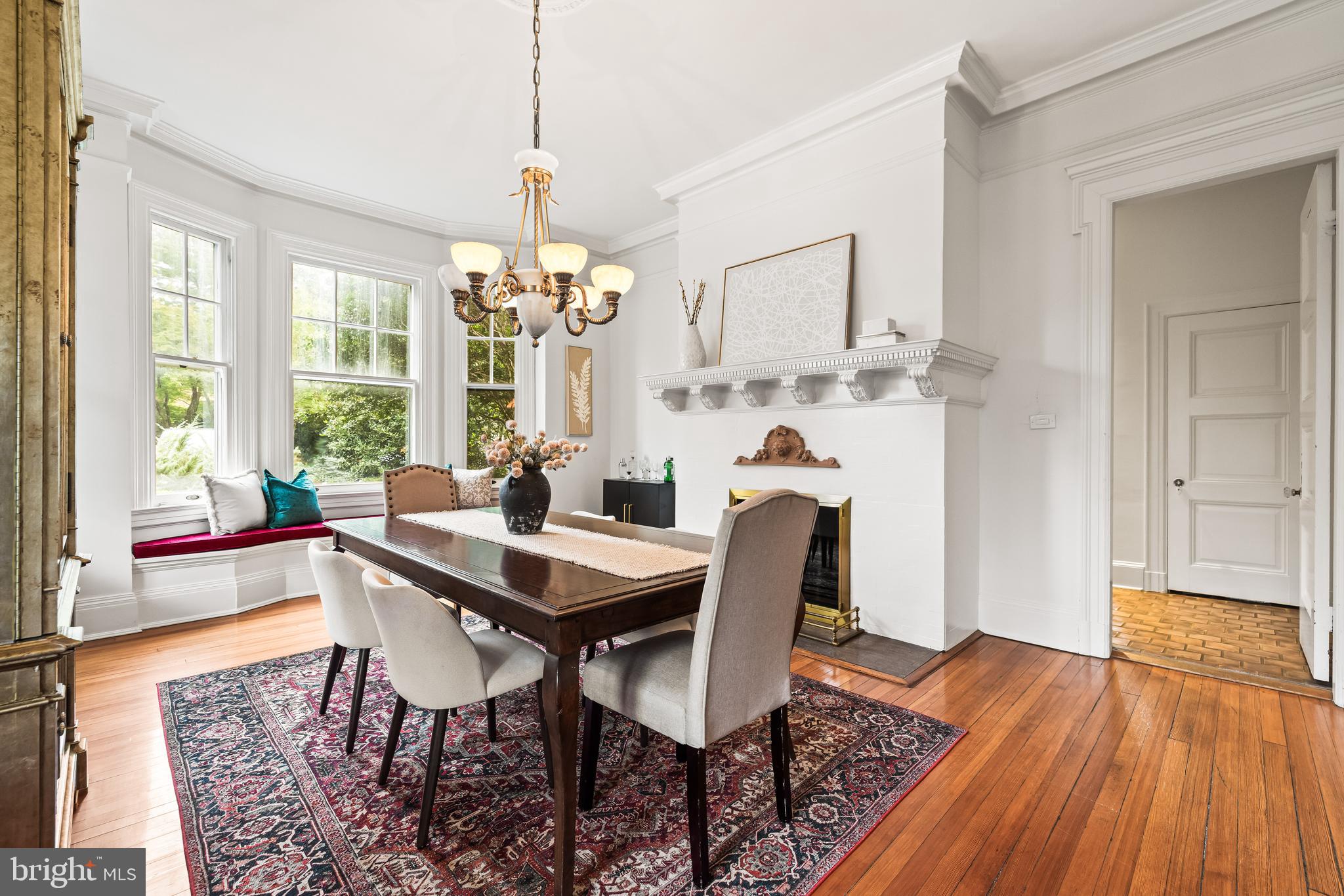 1926 Ruxton Road Ruxton, MD 21204 - Photo 40 of 106 a view of a dining room with furniture wooden floor and chandelier