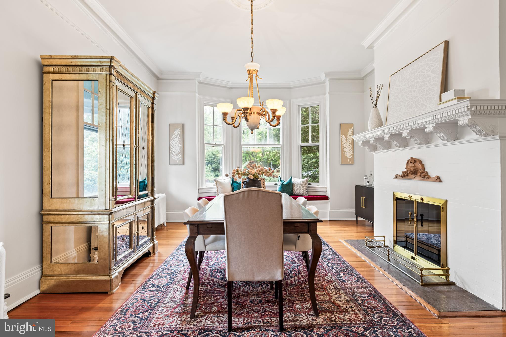 1926 Ruxton Road Ruxton, MD 21204 - Photo 41 of 106 a dining room with furniture a chandelier and wooden floor