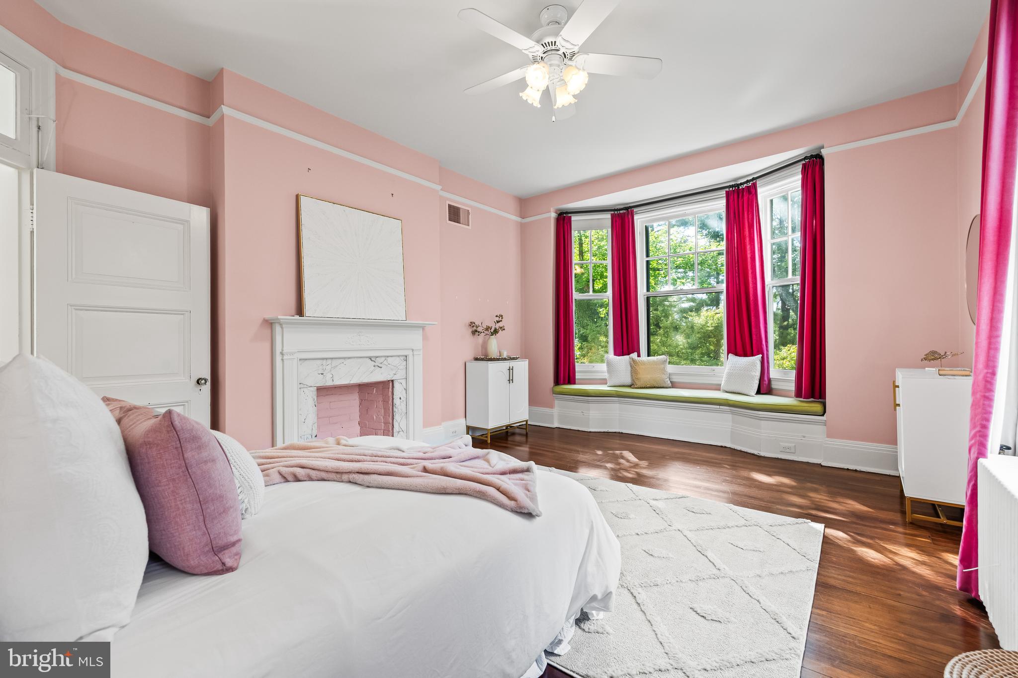 1926 Ruxton Road Ruxton, MD 21204 - Photo 64 of 106 a spacious bedroom with a large bed and a large window