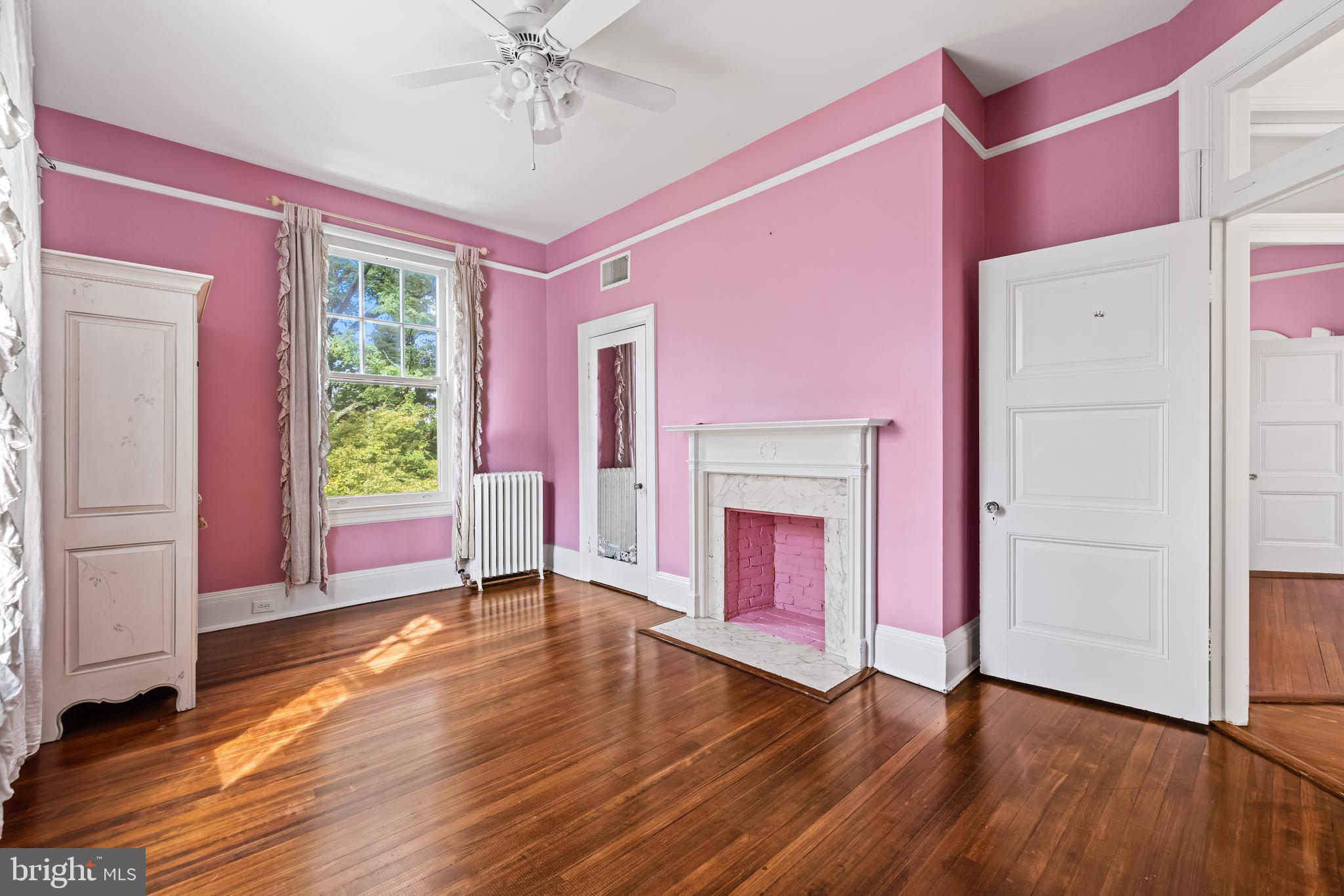 1926 Ruxton Road Ruxton, MD 21204 - Photo 67 of 106 a view of an empty room with window wooden floor and front door