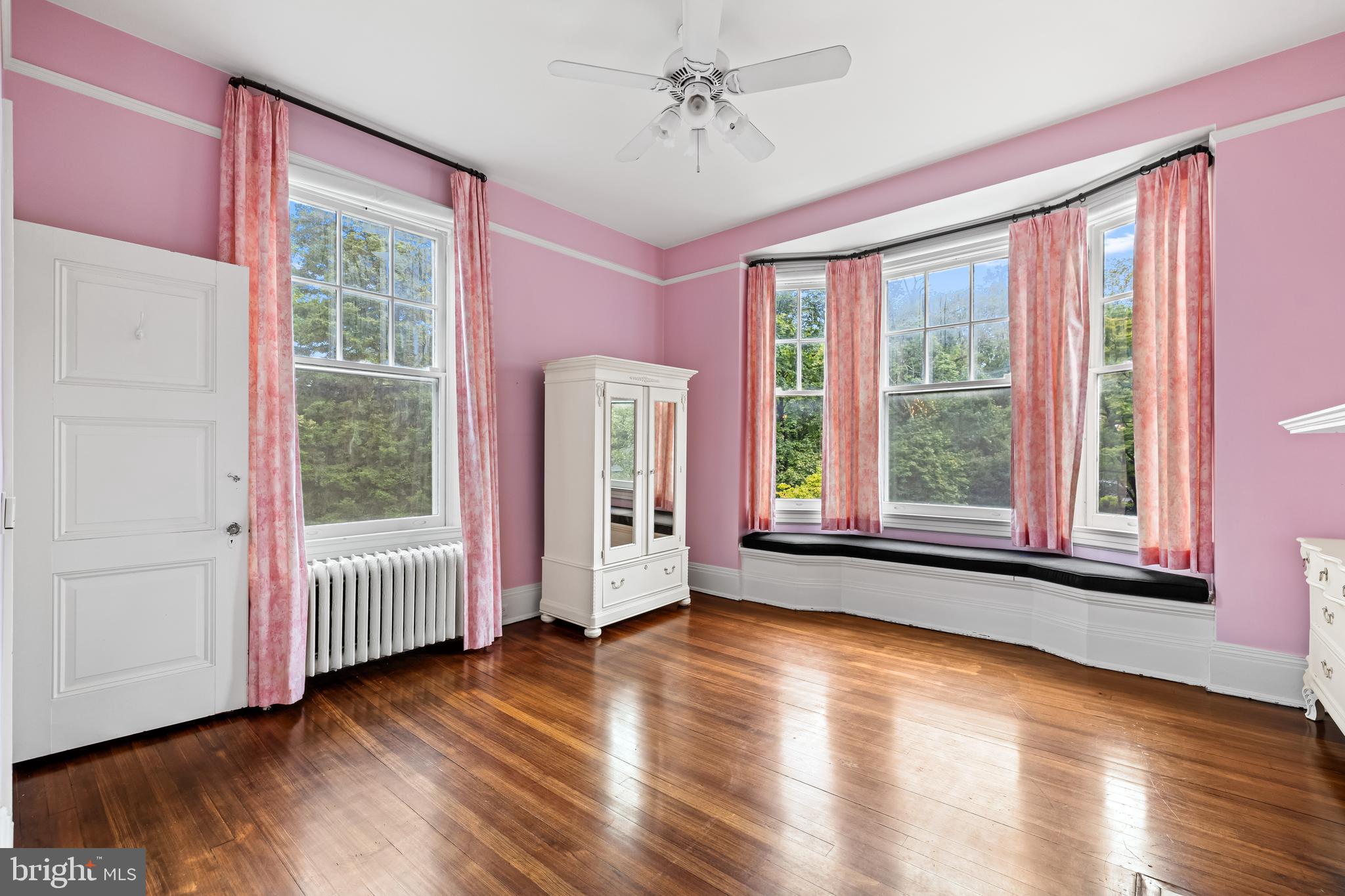 1926 Ruxton Road Ruxton, MD 21204 - Photo 68 of 106 a view of an empty room with wooden floor and a window