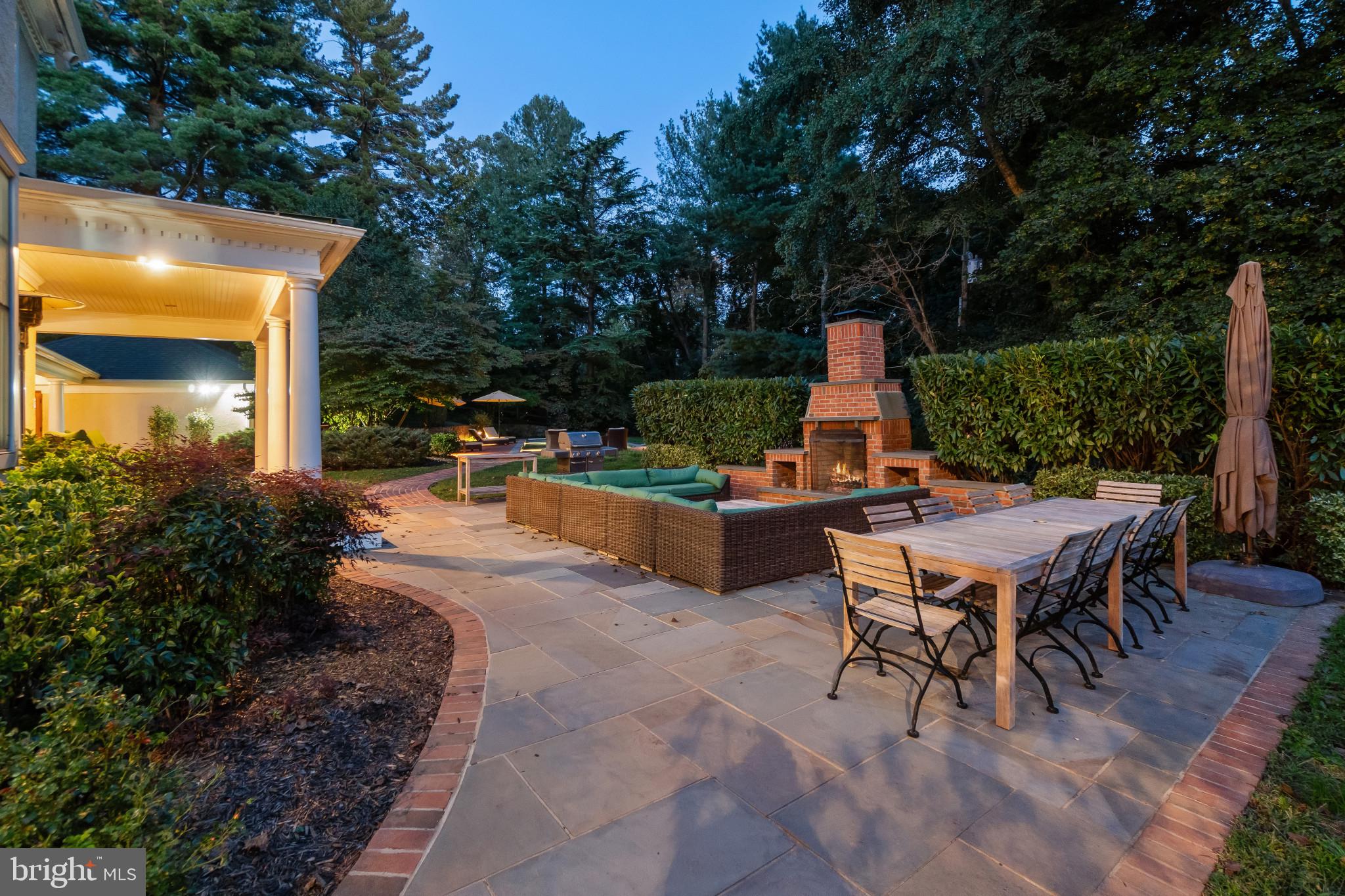 1926 Ruxton Road Ruxton, MD 21204 - Photo 7 of 108 a view of a dinning table and chairs in the patio
