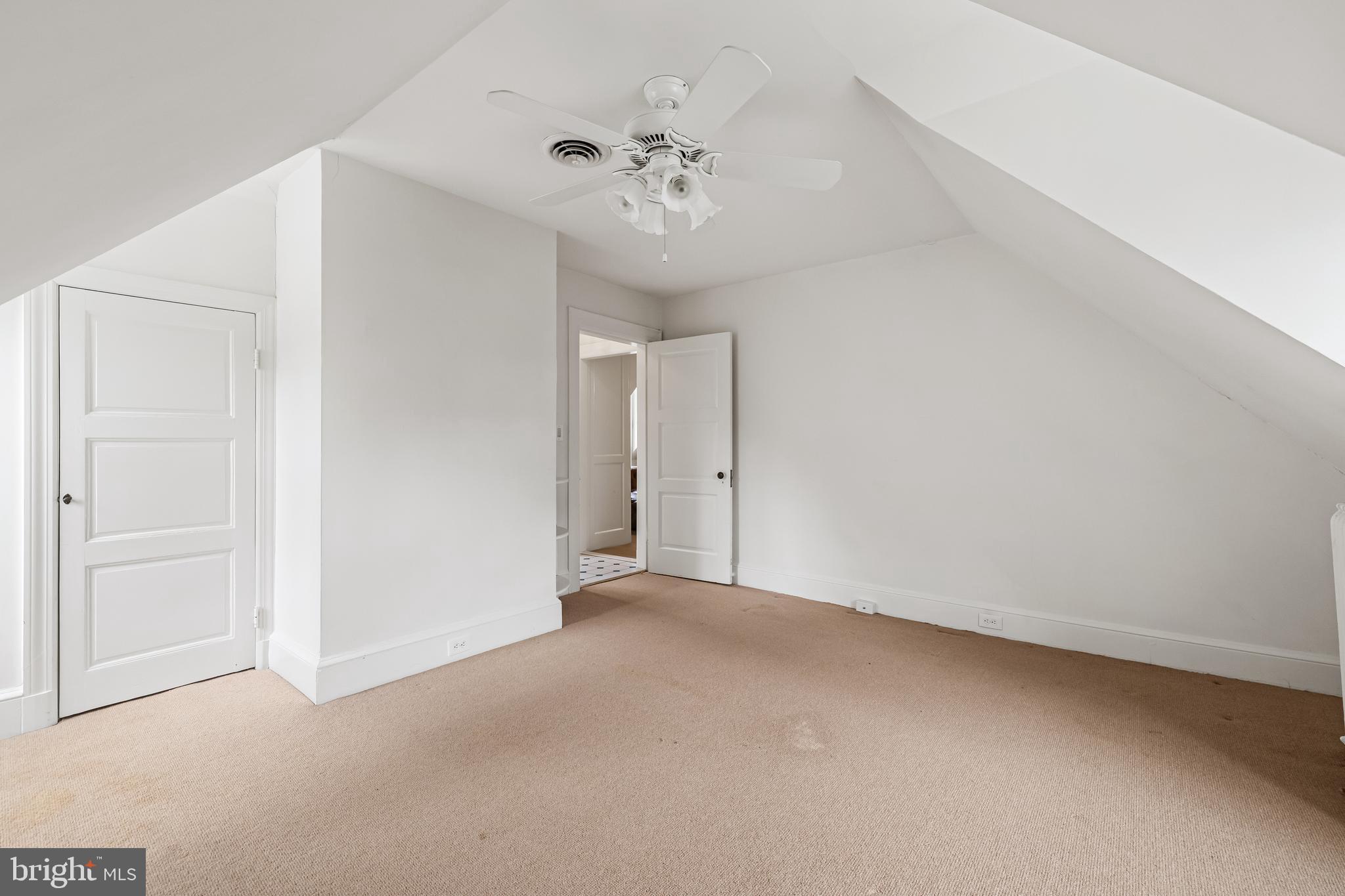 1926 Ruxton Road Ruxton, MD 21204 - Photo 77 of 108 a view of an empty room with a ceiling fan