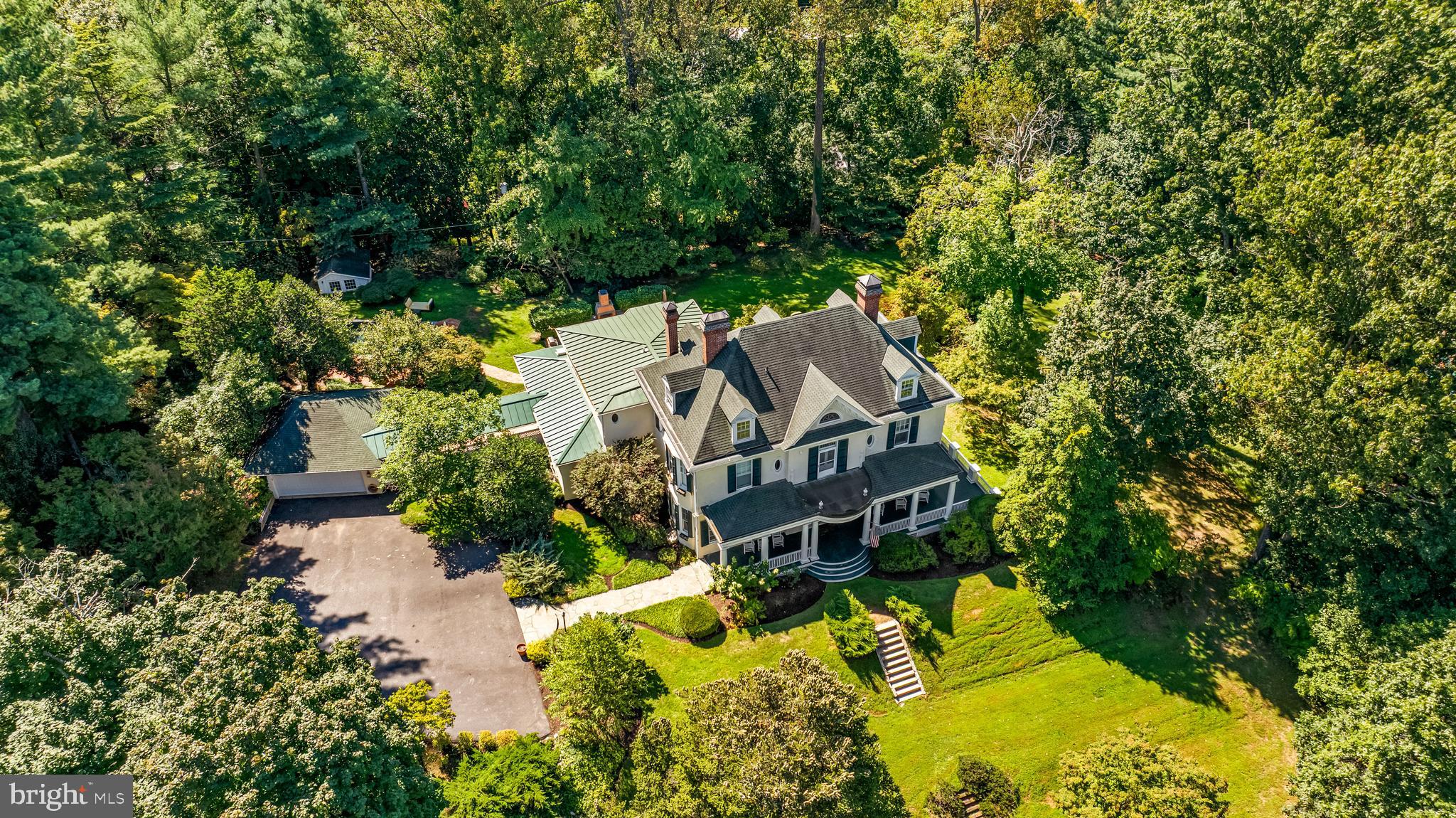 1926 Ruxton Road Ruxton, MD 21204 - Photo 79 of 106 an aerial view of a house with a big yard and large trees