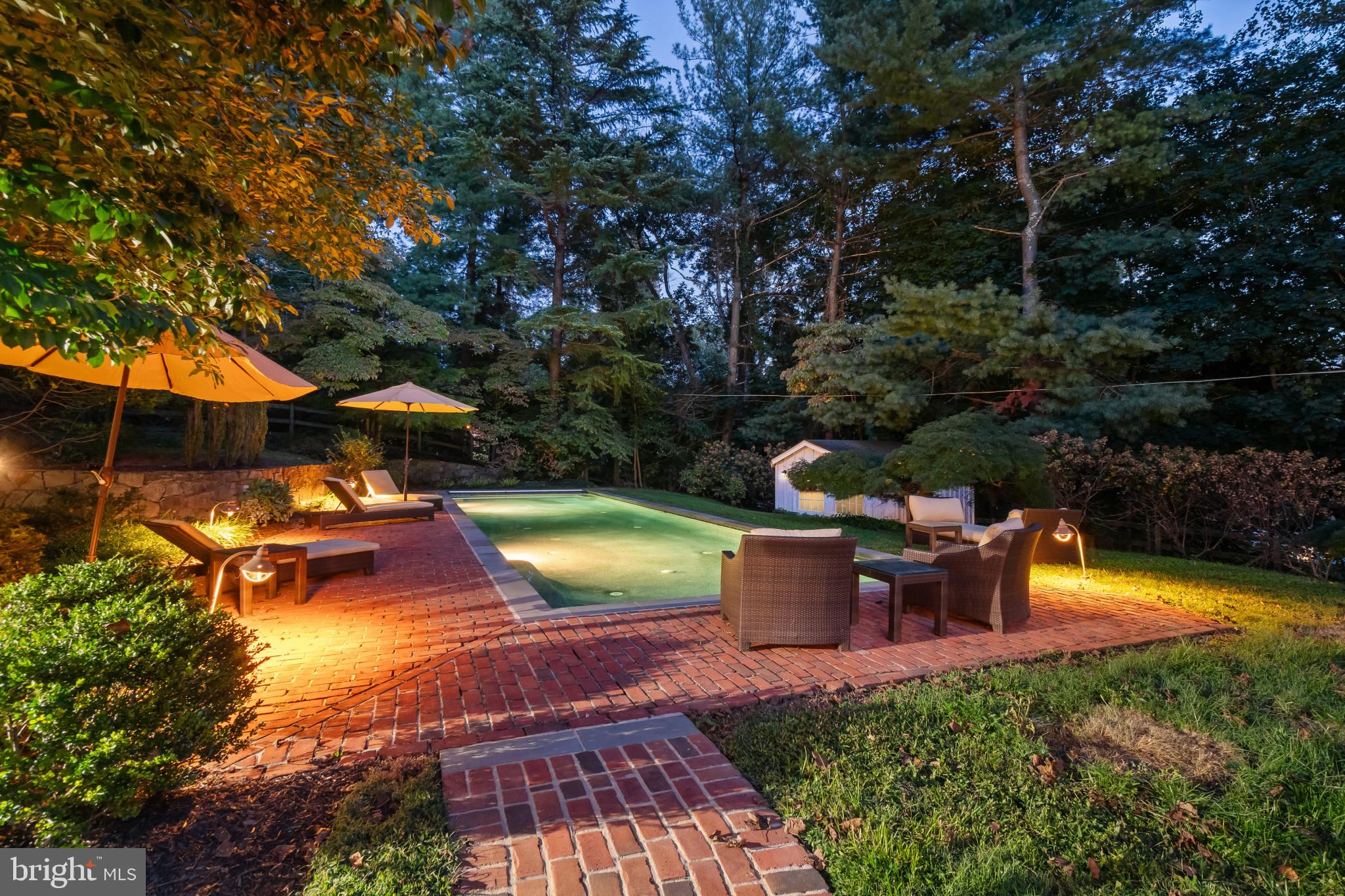 1926 Ruxton Road Ruxton, MD 21204 - Photo 82 of 108 a view of a swimming pool with a patio