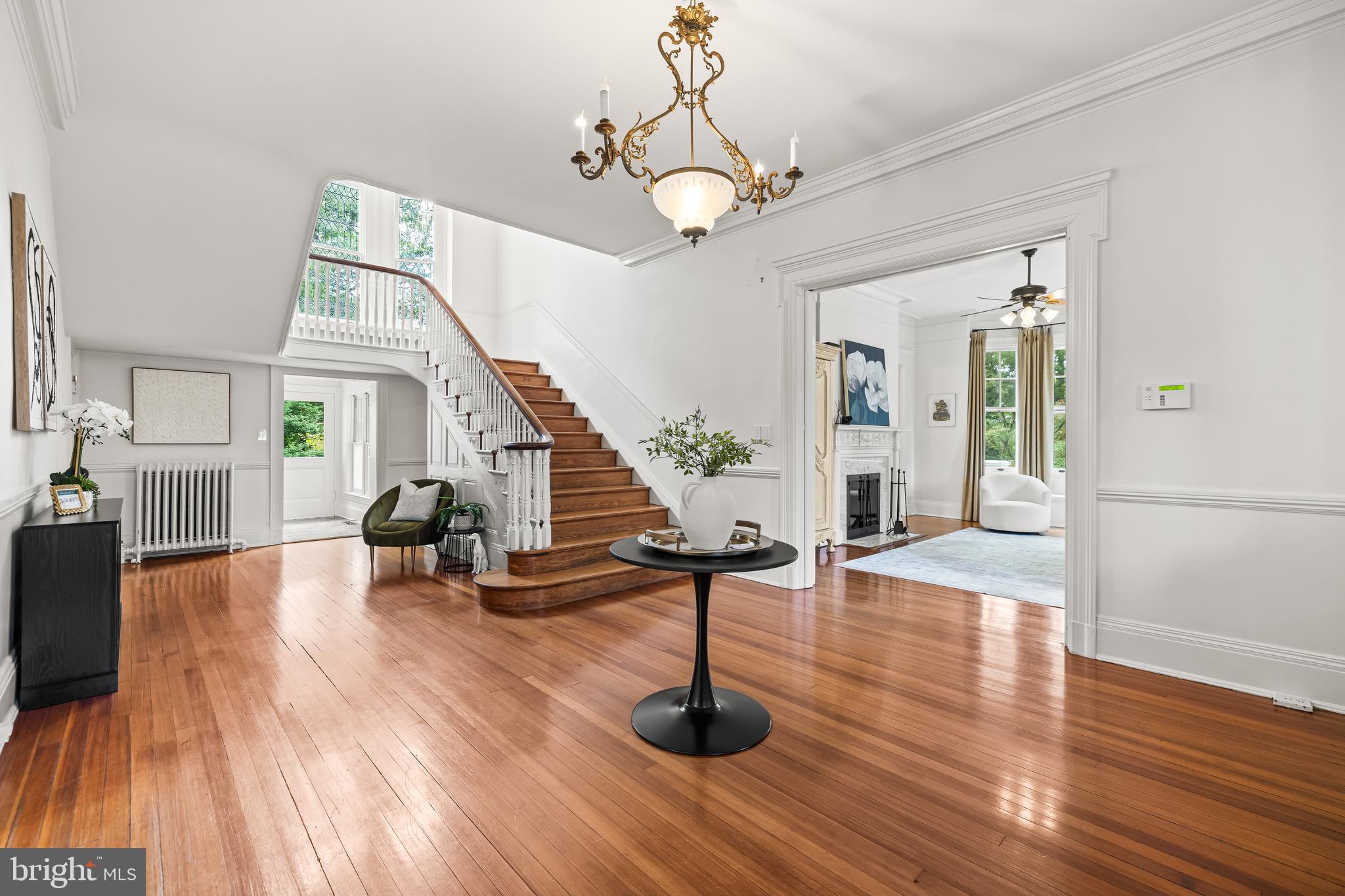 1926 Ruxton Road Ruxton, MD 21204 - Photo 9 of 108 a view of entryway with wooden floor and stairs