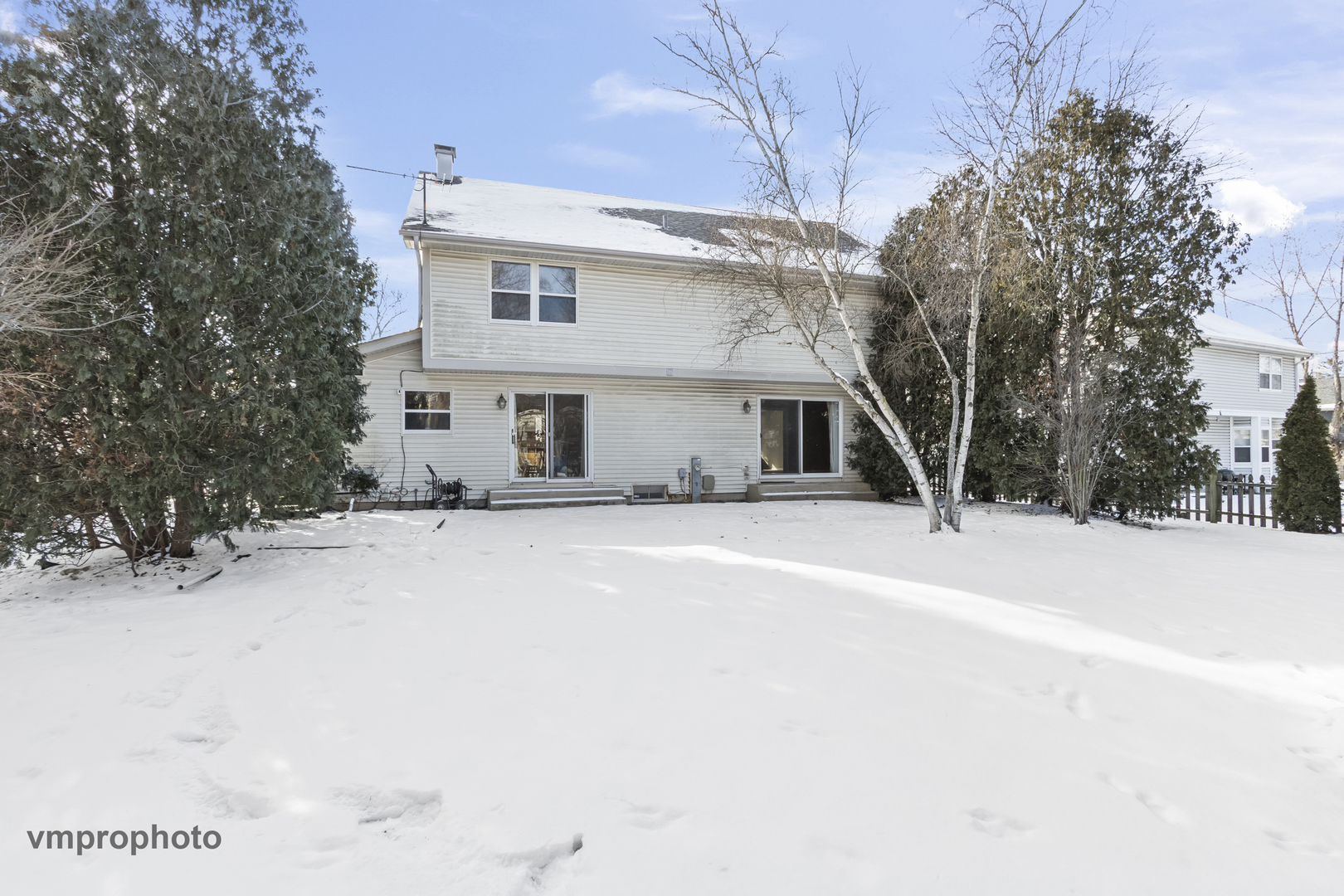 246 Montclair Road Vernon Hills, IL 60061 - Photo 33 of 42 a view of a house with a snow in the yard