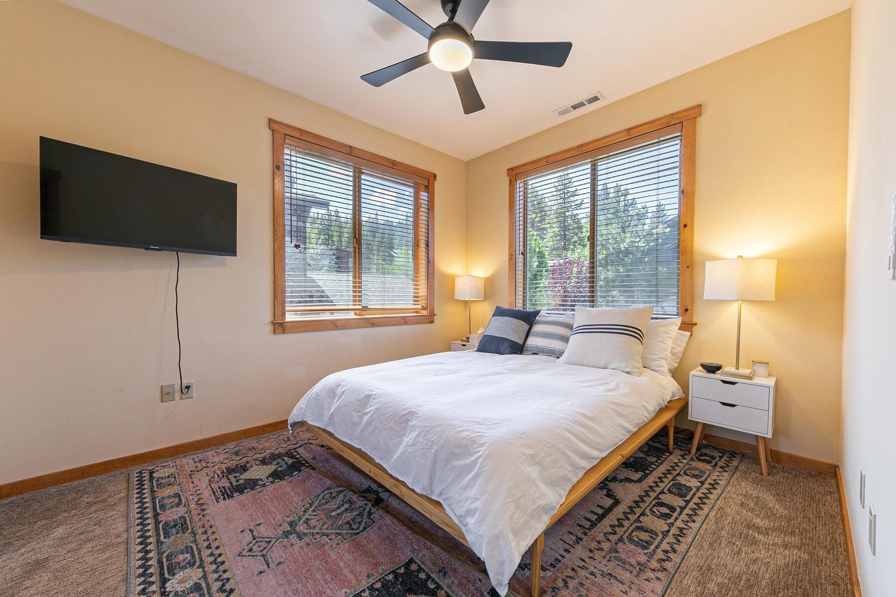 10903 Cinnabar Way, Unit 4 Truckee, CA 96161 - Photo 19 of 28 a bedroom with a bed and a window