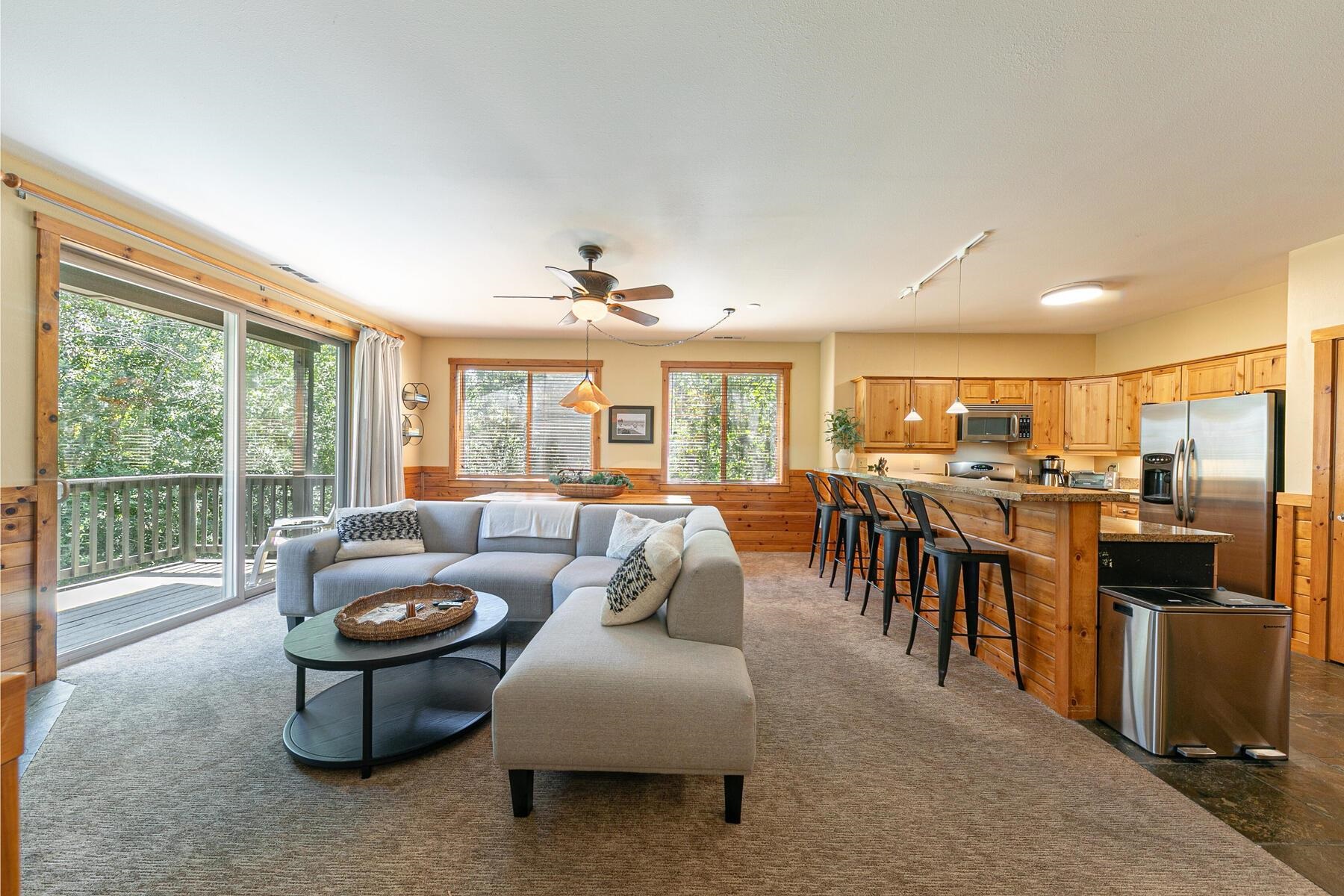 10903 Cinnabar Way, Unit 4 Truckee, CA 96161 - Photo 3 of 28 a living room with furniture and a large window