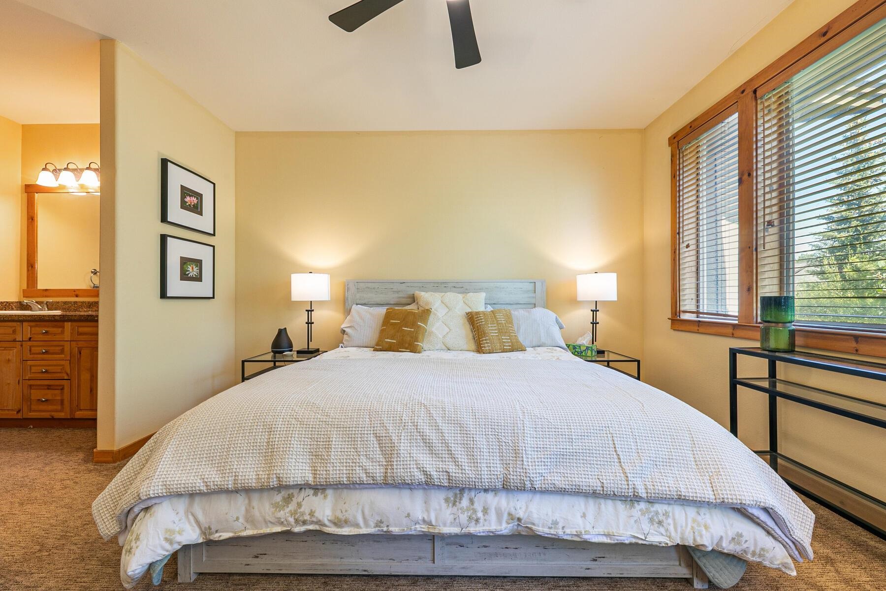 10903 Cinnabar Way, Unit 4 Truckee, CA 96161 - Photo 4 of 28 a bedroom with a bed and painting on the wall