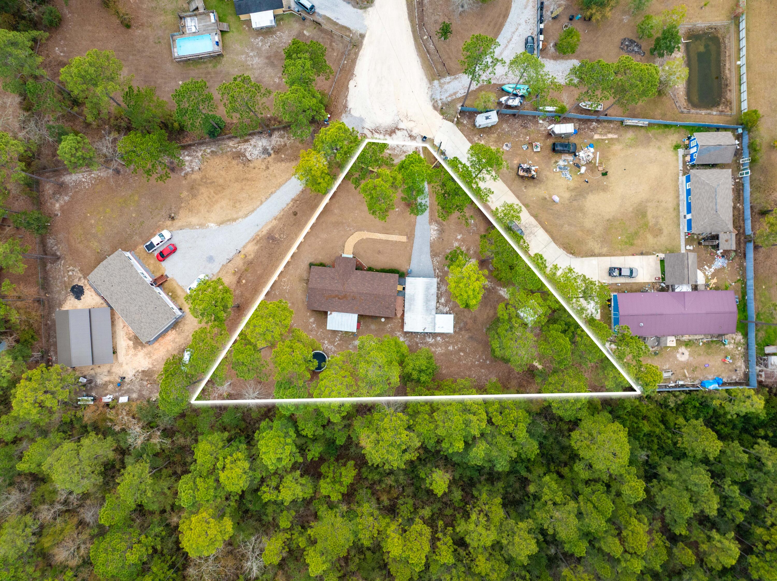 60 Magnolia Court Freeport, FL 32439 - Photo 29 of 29 60 Magnolia Aerial Outlined-4