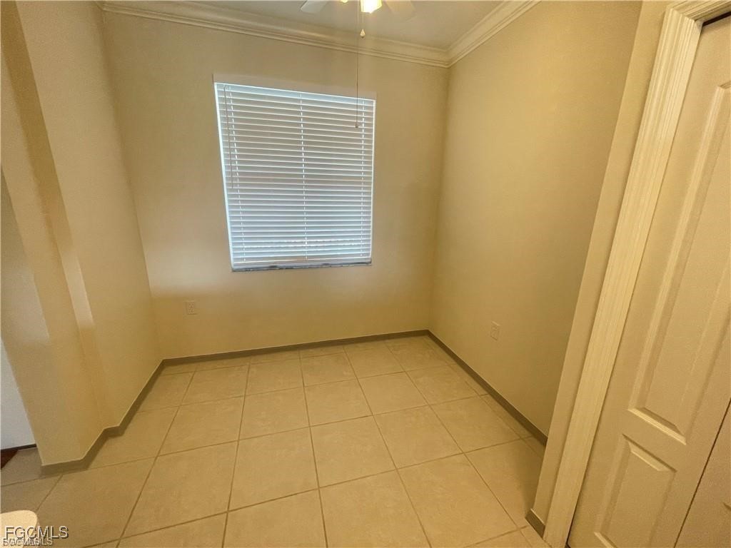 8550 Kingbird Loop, Unit 635 Estero, FL 33967 - Photo 4 of 12 a view of an empty room with a window