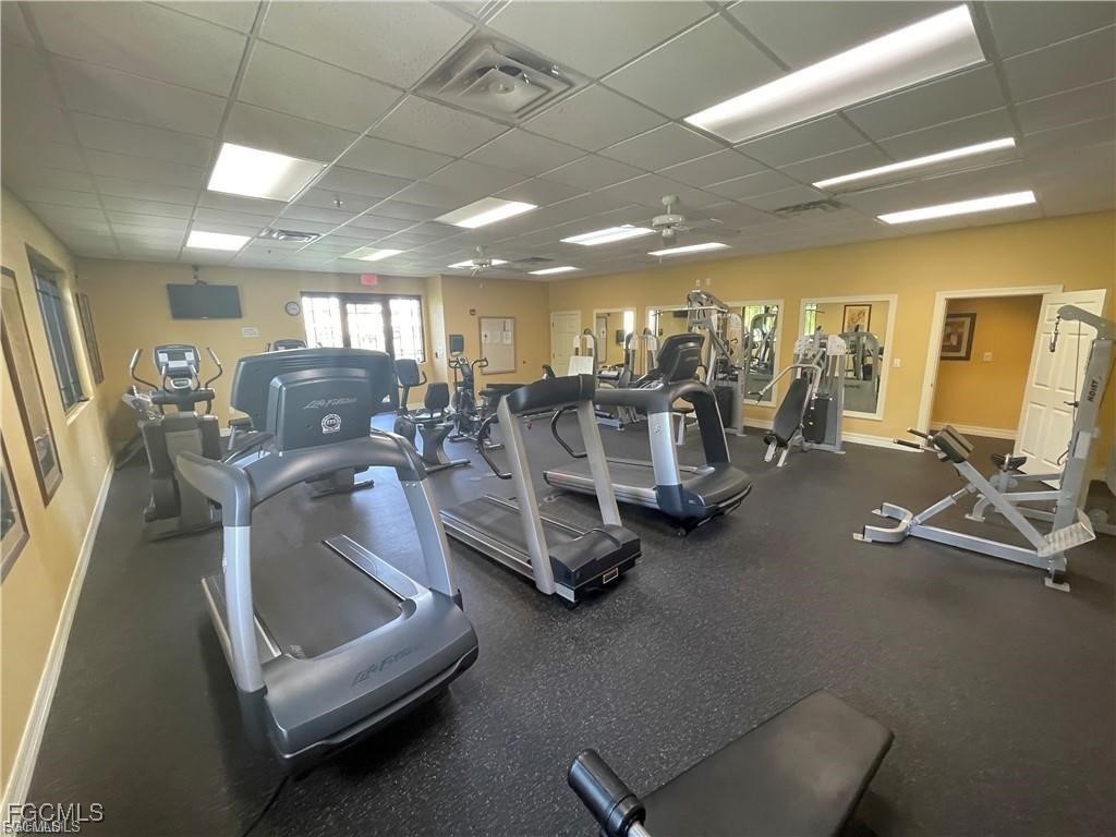 8550 Kingbird Loop, Unit 635 Estero, FL 33967 - Photo 10 of 12 a view of a room with gym equipment