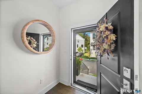 view of a entryway door with wooden floor
