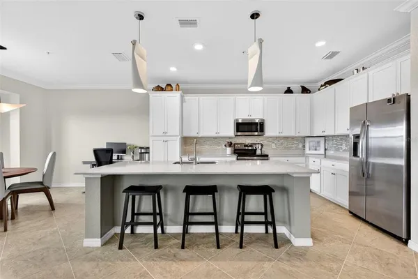 a desktop computer sitting on top of a desk and chair