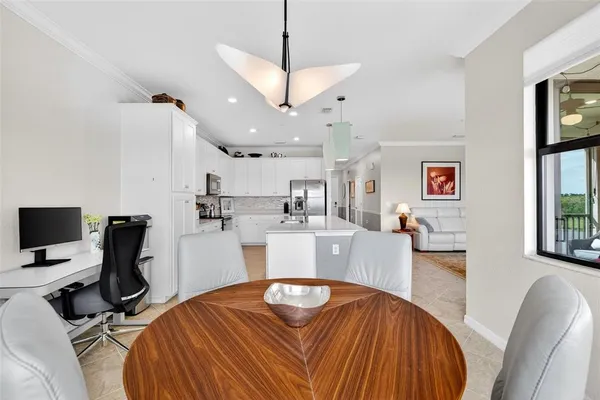 a view of a balcony with furniture and garden