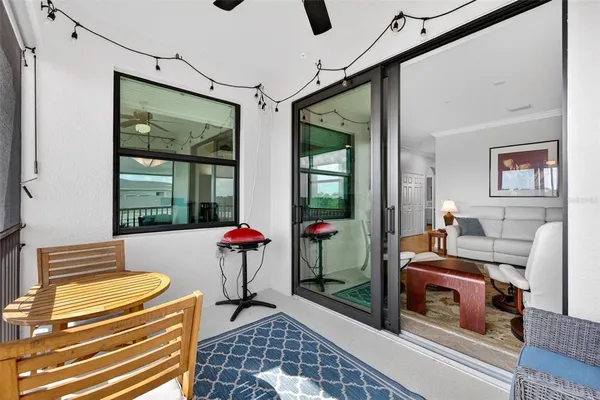 a view of a swimming pool with a house in the background