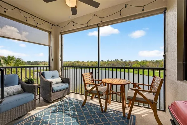 a front view of multiple houses with yard