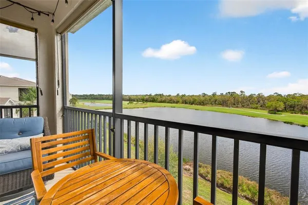 a view of a fountain in front of a house