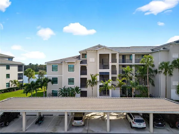 a view of a swimming pool and an outdoor space