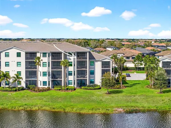 a view of a swimming pool with a yard