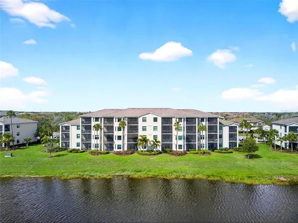 a view of a backyard with a table and chairs