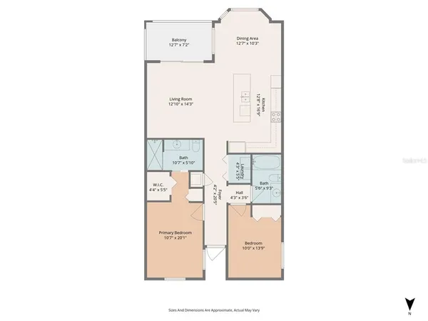 a front view of a house with a yard table and chairs