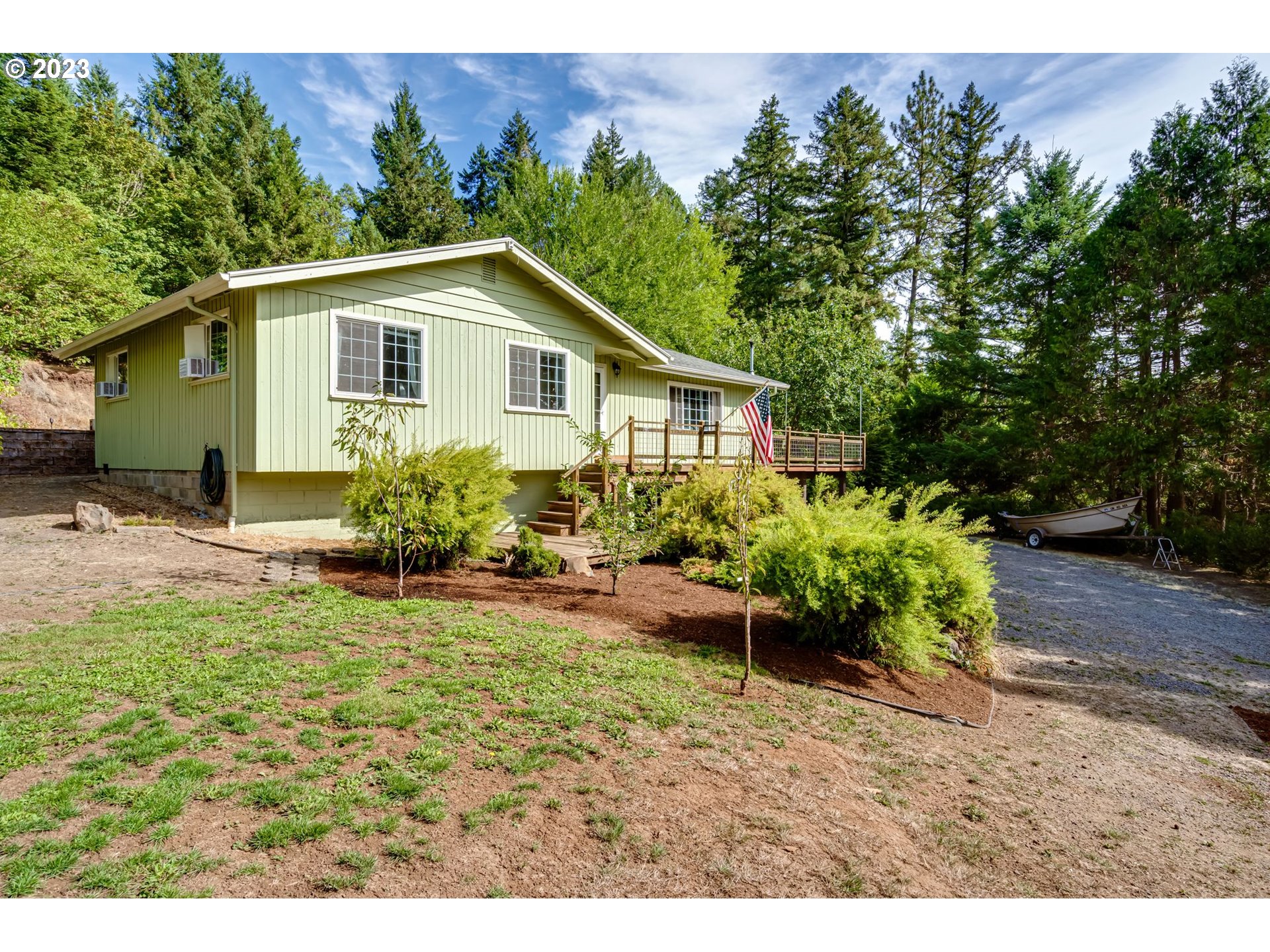 82277 Rattlesnake Road Dexter, OR 97431 - Photo 3 of 42 a view of a house with backyard and sitting area