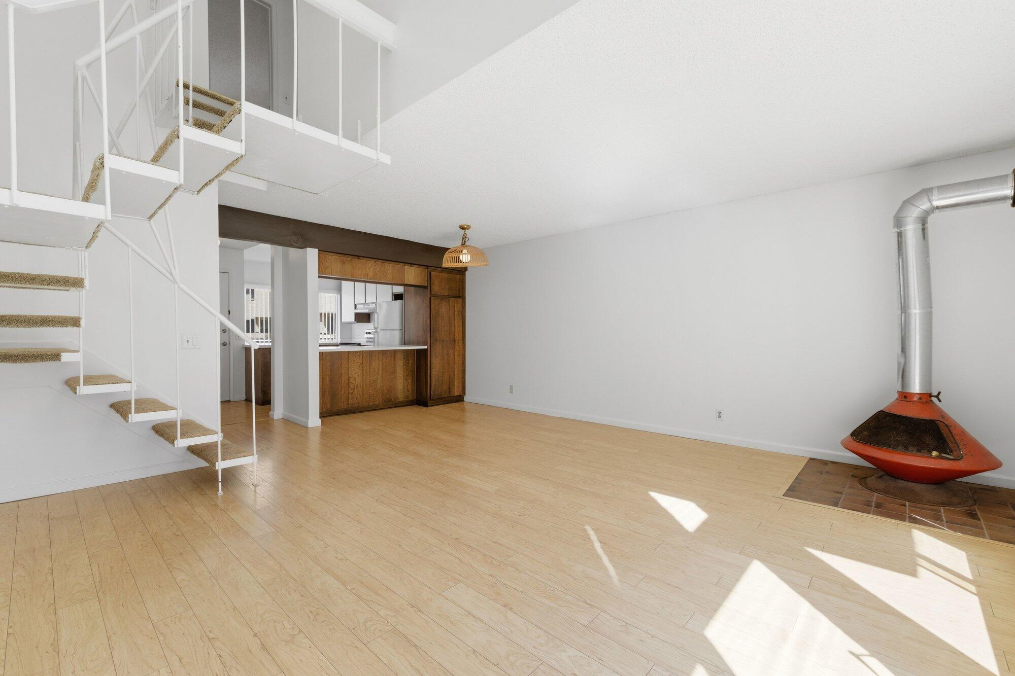 5455 8th Street, Unit 58 Carpinteria, CA 93013 - Photo 20 of 38 a view of empty room with wooden floor and cabinet