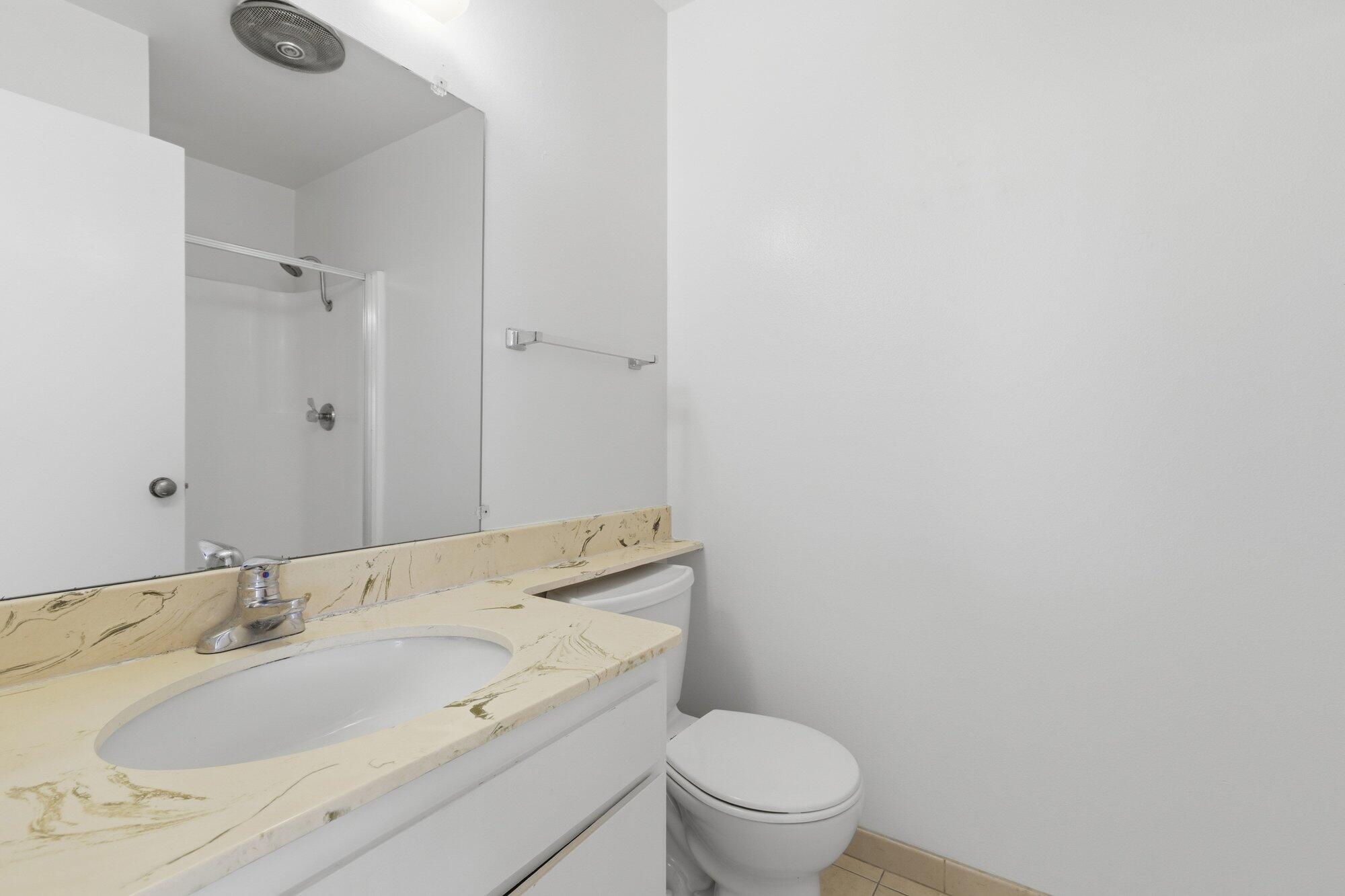 5455 8th Street, Unit 58 Carpinteria, CA 93013 - Photo 27 of 38 a bath room with a sink and a toilet