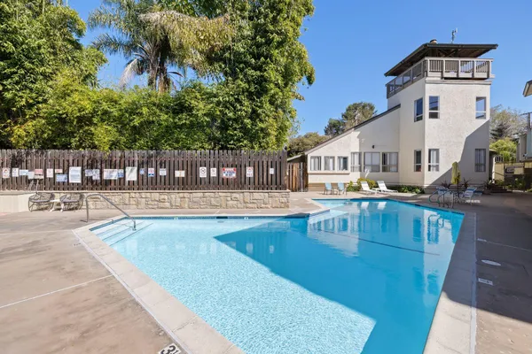 a view of a house with swimming pool